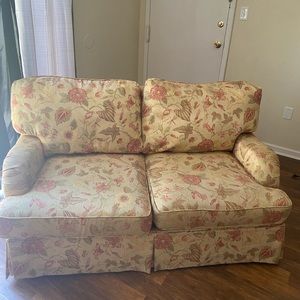 This is a yellowish goldish couch.